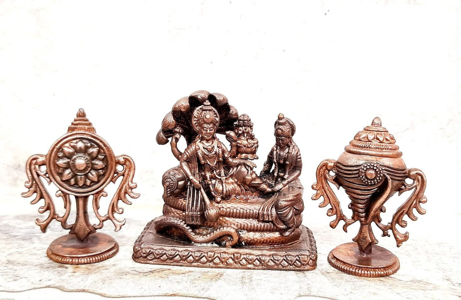 Brownish-Orange Copper Idols Of God Vishnu Along With Mahalakshmi Lying In Adisesha Sanghu Chakram By Unikraf , 2.3 Inches, 320G, Patina Antique Finish, Pack Of 3 Piece