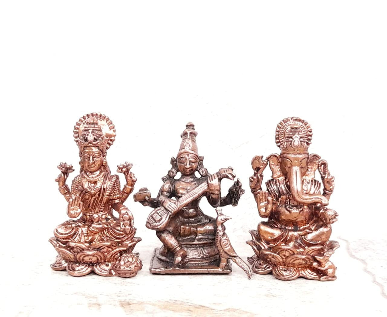 Brownish-Orange Copper Idols Of God Lakshmi, Saraswathi And Ganesh, 164G, Patina Antique Finish, Pack Of 1 Piece